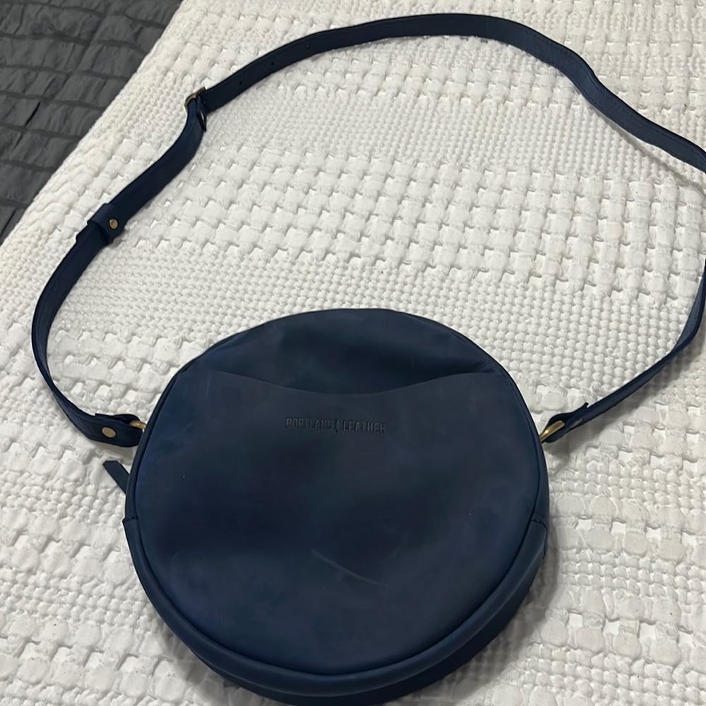 Portland leather sidekick round crossbody bag.